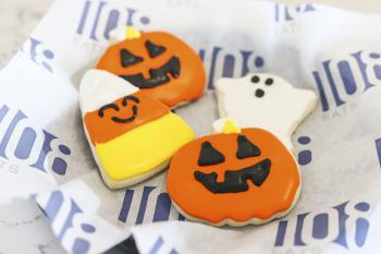 Halloween shaped cookies from 108 Eats Halloween shaped cookies, a ghost, pumpkin and candy corn on 108 Eats tissue paper